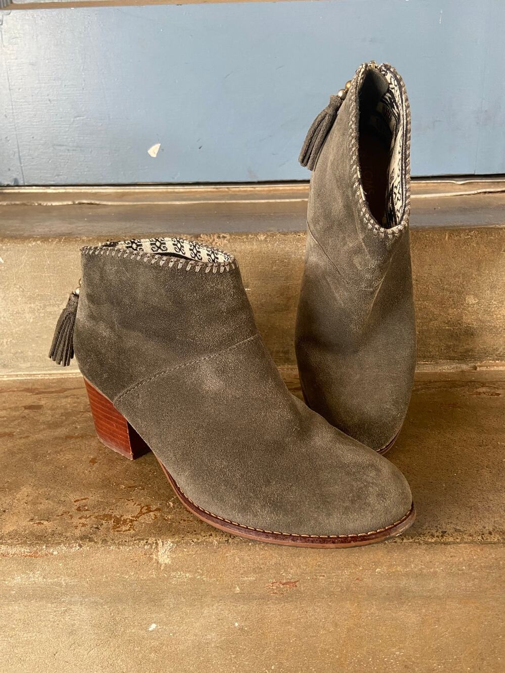Tom’s olive green suede ankle boots with block heel and back zip entry